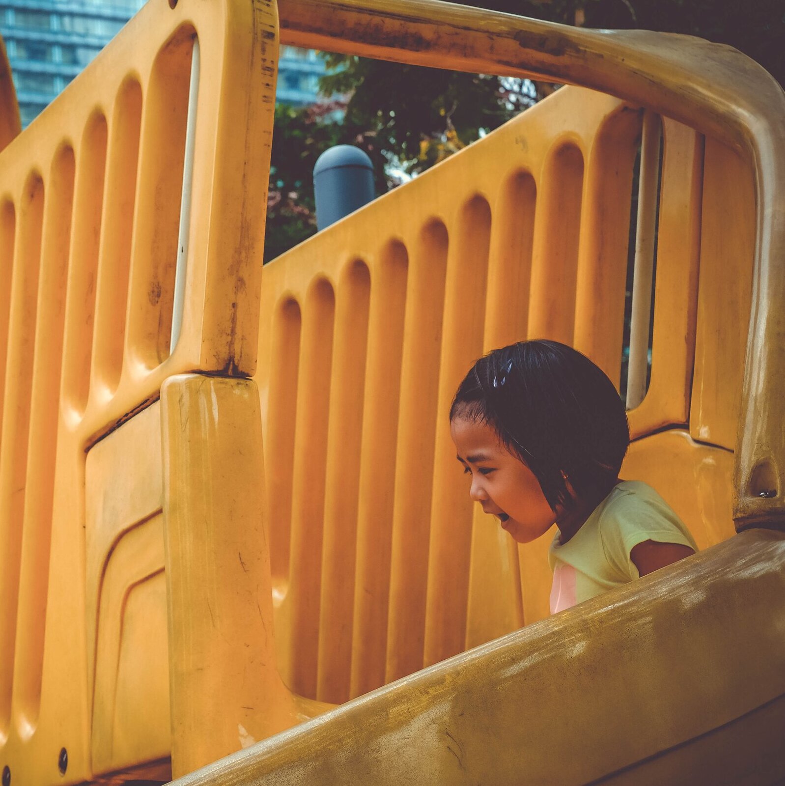 girl going down slide